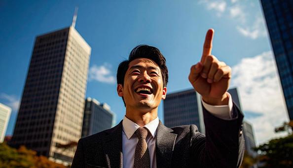 都市背景で人差し指を立てるビジネスマン 都市背景で人差し指を立てるビジネスマンの写真