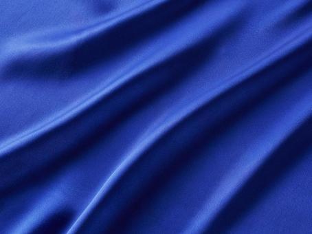 青いサテン生地の布の写真