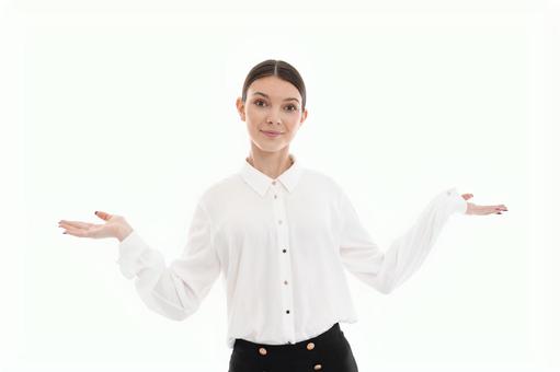 お手上げのポーズのカメラ目線の女性 お手上げのポーズのカメラ目線の女性 女性,お手上げ,微笑むの写真素材