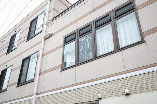 賃貸物件の窓ガラス 施設,分譲住宅,建物の写真素材