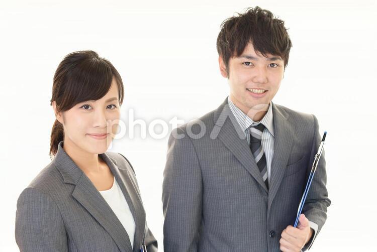 微笑むビジネスマンとビジネスウーマン 男性,女性,ビジネスマンの写真素材