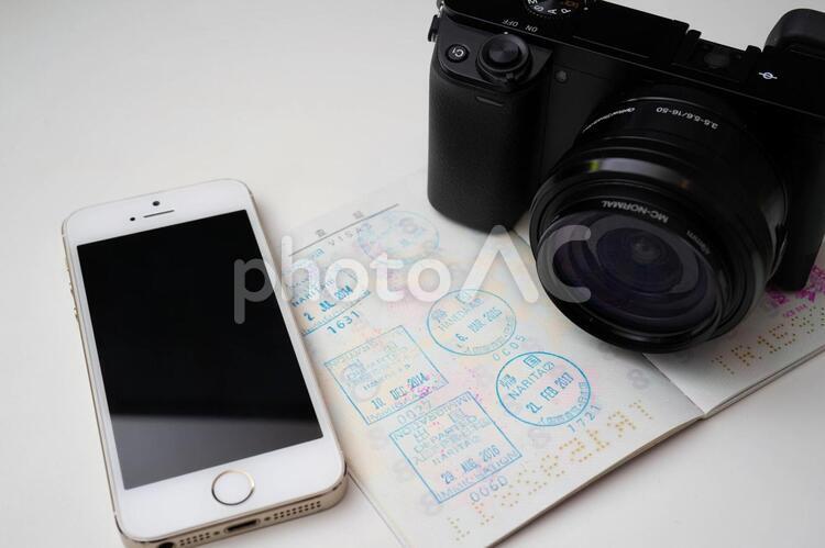 パスポートとデジタルカメラ パスポート,デジカメ,デジタルカメラの写真素材