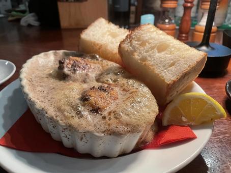 お肉料理とバケット お肉料理,バケット,食事の写真素材