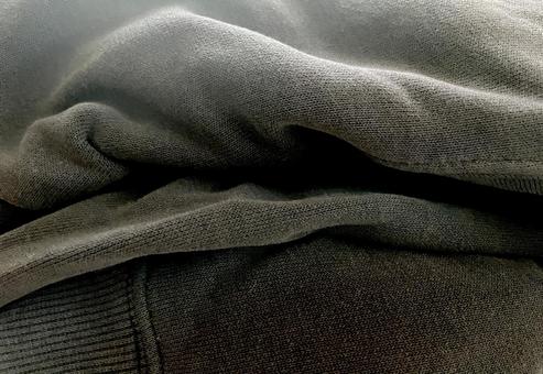 黒い柔らかな布の背景素材 黒,布,背景の写真素材