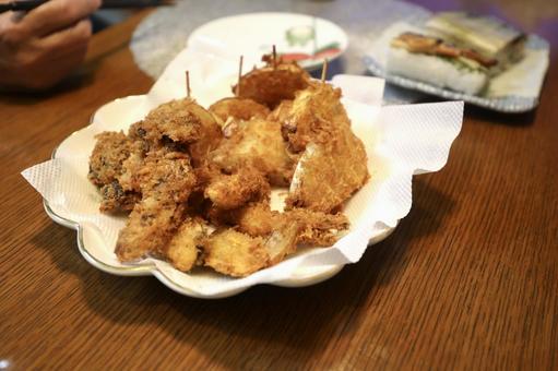 フライと鯖寿司がある食事風景 カキフライ,おかず,惣菜の写真素材