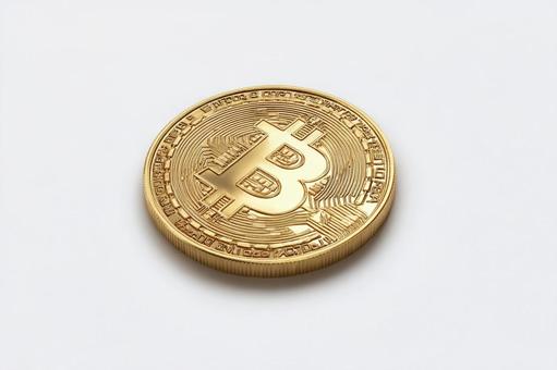 純白の背景に輝く金色のビットコインの写真