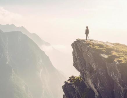 崖の女性と絶景 崖の女性と絶景の写真