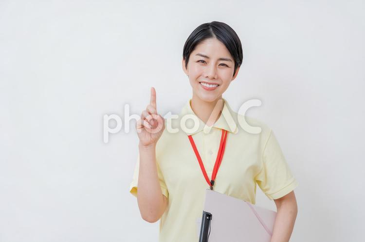 提案する介護士の女性。 提案,介護,介護福祉士の写真素材