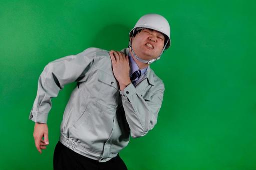 作業員の肩の痛み 作業員の肩の痛みの写真