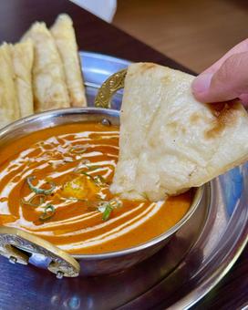 バターチキンカレーとチーズナン バターチキンカレーとチーズナン バターチキンカレー,チーズナン,カリーの写真素材