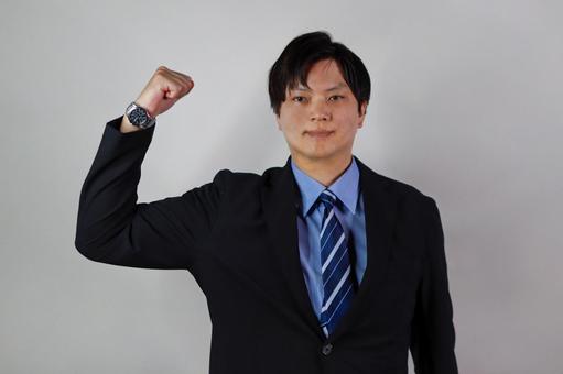 力強いポーズのビジネスマン 力強いポーズのビジネスマン ビジネスマン,男性,スーツの写真素材