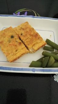たまご焼きとインゲン豆 たまご焼きとインゲン豆の写真