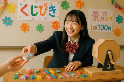 くじ引きブースで景品を渡すの写真