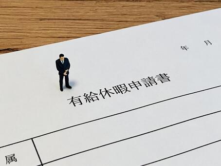 有給休暇申請書とビジネスマン（ジオラマ） 有給休暇,有給,有休の写真素材