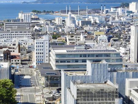 城から見下ろす香川県丸亀市役所新庁舎 城から見下ろす香川県丸亀市役所新庁舎 丸亀市,丸亀市役所,市役所の写真素材