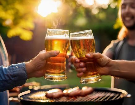 バーベキューでビール バーベキューでビールの写真