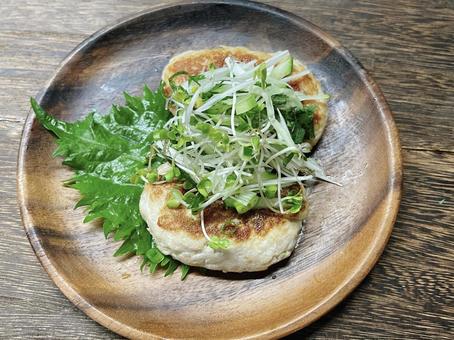 マグロの豆腐ハンバーグ香味野菜乗せ マグロの豆腐ハンバーグ香味野菜乗せ マグロの豆腐ハンバーグ,豆腐ハンバーグ,魚ハンバーグの写真素材
