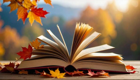 読書の秋 机の上の本 落ち葉の紅葉 読書の秋 机の上の本 落ち葉の紅葉の写真