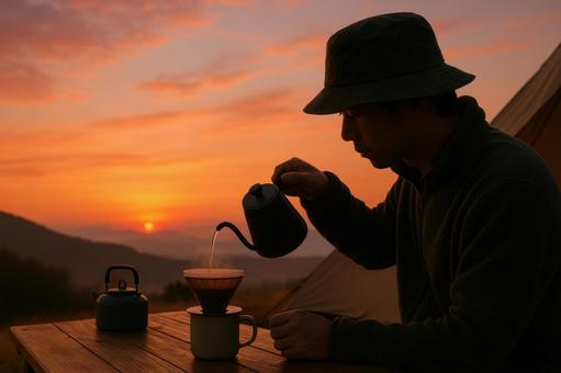 朝焼けの中でコーヒーを淹れる 朝焼けの中でコーヒーを淹れるの写真