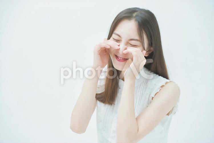 ストレスを抱えた表情をする若い女性 女性,失敗,顔の写真素材