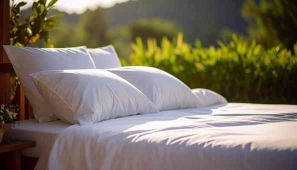 白いベッド 白いベッドの写真