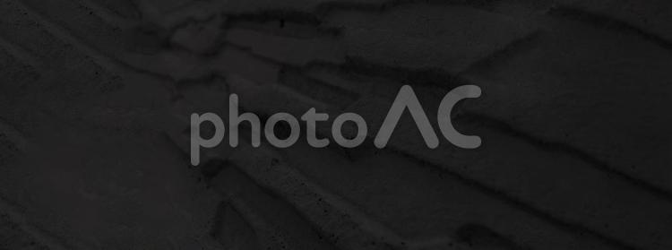 黒色の石の背景画像 横長斜めアングル 黒色の石の背景画像 横長斜めアングル 黒,背景,ブラックの写真素材