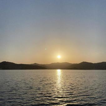 Photo, lake, sunset, mountain on the opposite bank, 