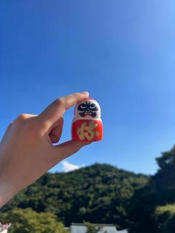 だるまと青空 だるまと青空の写真