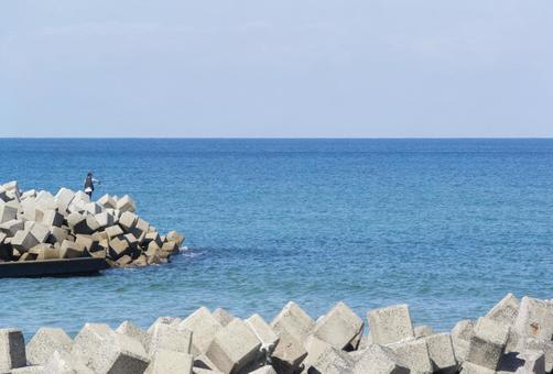 晴天の釣り人 魚釣り,海,波の写真素材