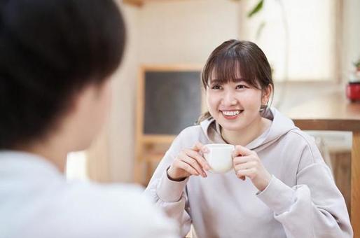 Asian couple having a conversation in the living room, couple, conversation, a smile, JPG