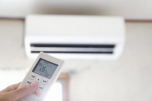 Hand turning on the air conditioner, JPG Hand turning on the air conditioner, JPG