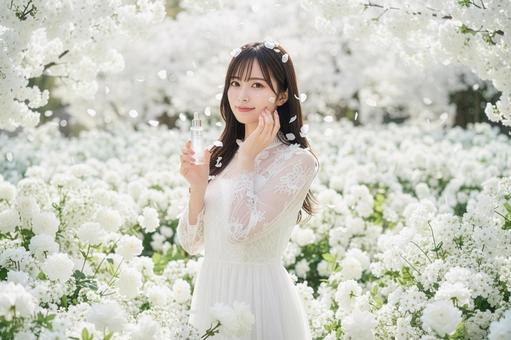 花に囲まれた女性 美容系CMのワンシーンの写真