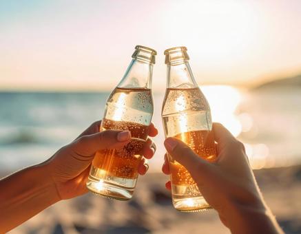 瓶に入った飲み物で乾杯 瓶に入った飲み物で乾杯の写真