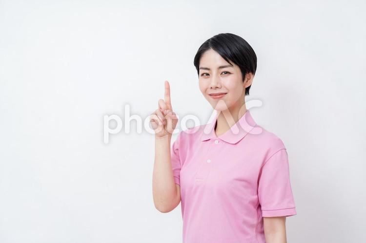 提案する介護福祉士の女性。 提案,紹介,推薦の写真素材