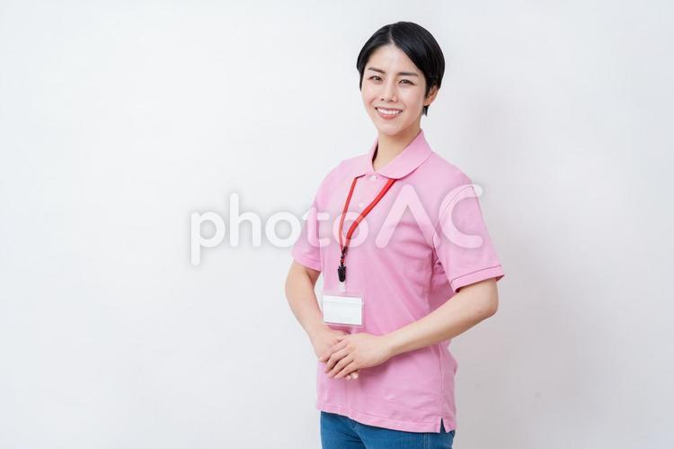 提案する介護士の女性。 介護,介護福祉士,介護士の写真素材