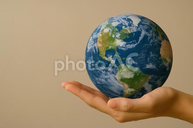 手のひらに地球をのせて 地球,地球儀,世界の写真素材