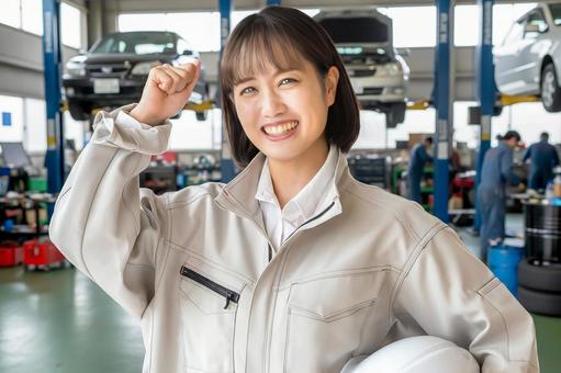 自動車工場と笑顔の女性 メンテナンス,女性,若者の写真素材