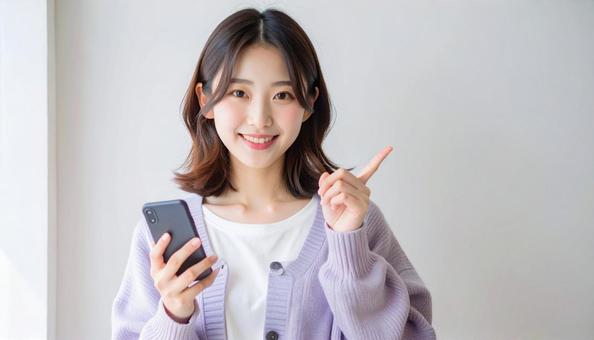 おすすめの指をさす人の写真