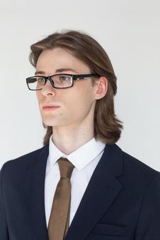 スーツを着てメガネをかけた男性 男性,外国人,欧米人の写真素材