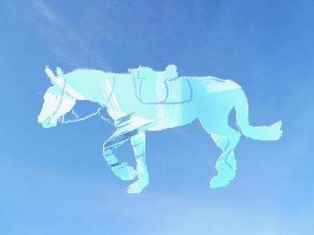 青空にかっぽする鞍をつけた水色の競技馬 年賀,午年,干支の写真素材