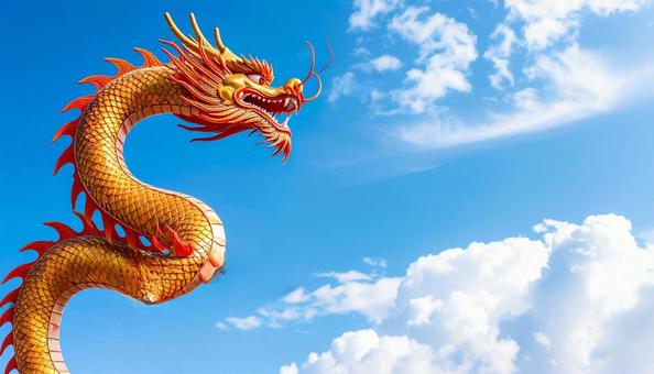 空を泳ぐ赤い龍の写真