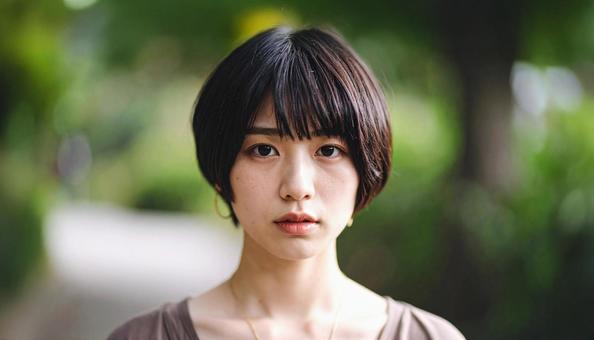 少し驚いている若い女性1 少し驚いている若い女性1の写真