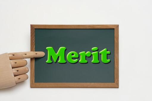 黒板にMeritの文字とマネキンの指 黒板,コピースペース,木製の写真素材