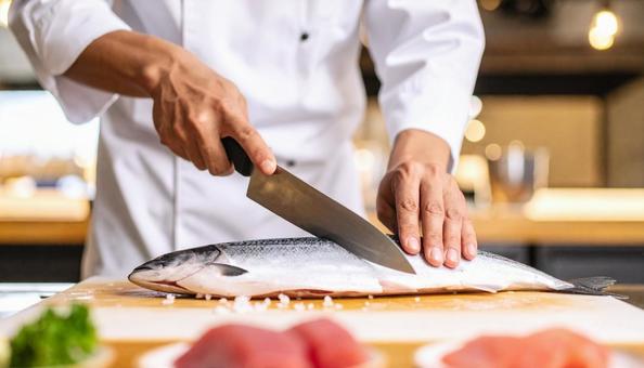 寿司職人の技 魚をさばいている職人 寿司職人の技 魚をさばいている職人の写真