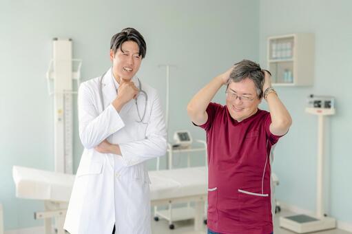 頭を抱える医師 医師,ドクター,白衣の写真素材