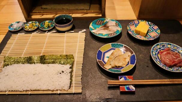 巻きすに広げた酢飯と海苔と寿司ネタ 巻き寿司,手巻き寿司,酢飯の写真素材
