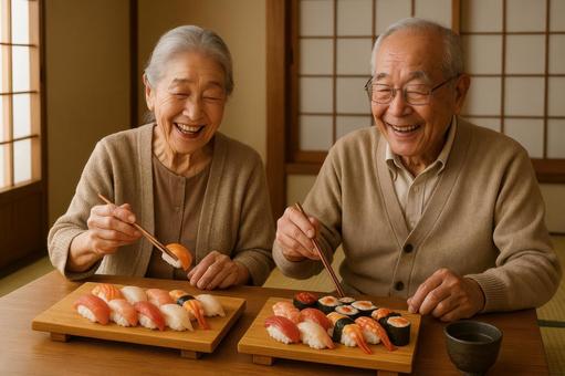 お寿司を囲む高齢夫婦 お寿司を囲む高齢夫婦の写真