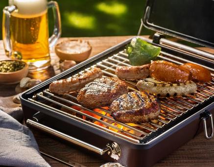 バーベキューでビールの写真