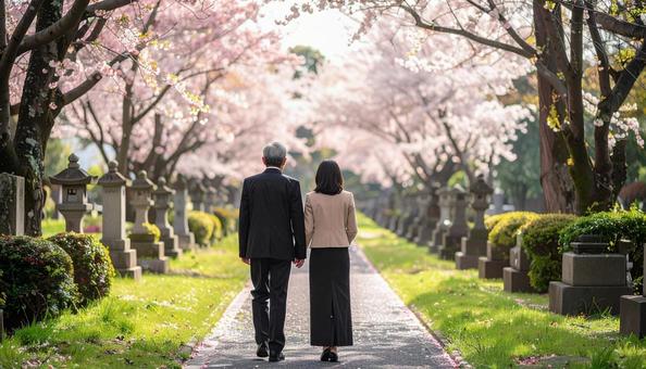 墓参り・お葬式に来た喪服の日本人夫婦 墓参り・お葬式に来た喪服の日本人夫婦の写真