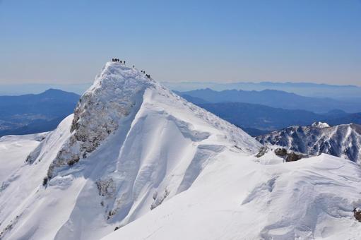雪の谷川岳山頂 山頂,頂上,谷川岳の写真素材